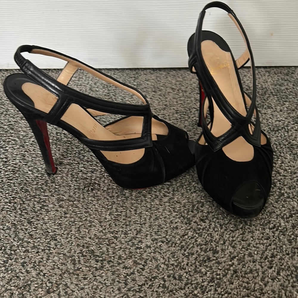 Christian Louboutin strappy sandals. So sexy. They go with jeans or dresses